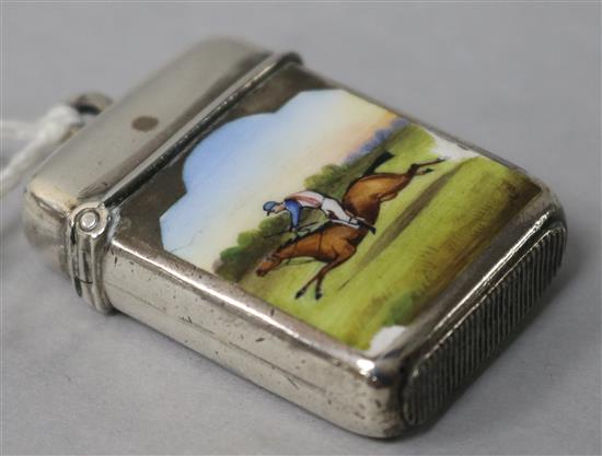 A Victorian silver vesta case enamelled with a horse and jockey, by Joseph Hayes Taylor, Birmingham, 1881, 1.5in.